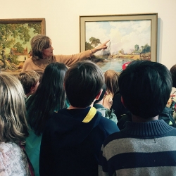 Students looking at paintings
