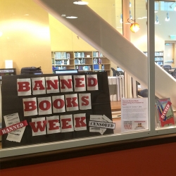 Photo of display window at IVC Library with banned books