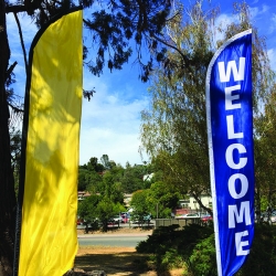 Yellow feather flag and welcome feather flag