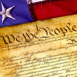 U.S. flag and Constitution