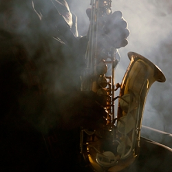 Saxophone surrounded by smoke