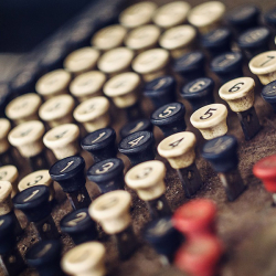 Close up photo of an old cash register