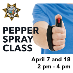 Com police seal, hand holding pepper spray, and class dates